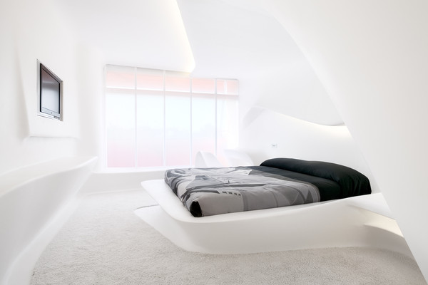 Wall cladding made of solid surface material -  Photo: diephotodesigner, Design: Zaha Hadid