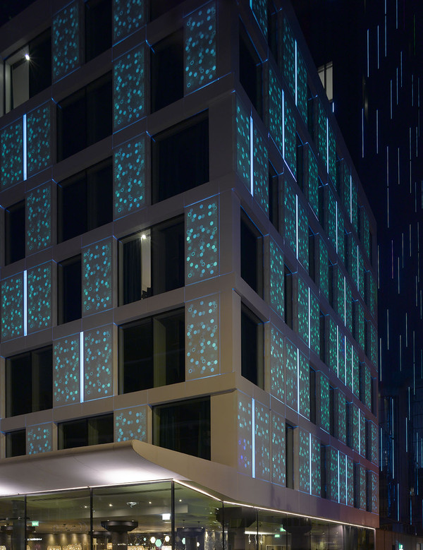 backlit outer facade made of solid surface material - Photo: Nick Kane